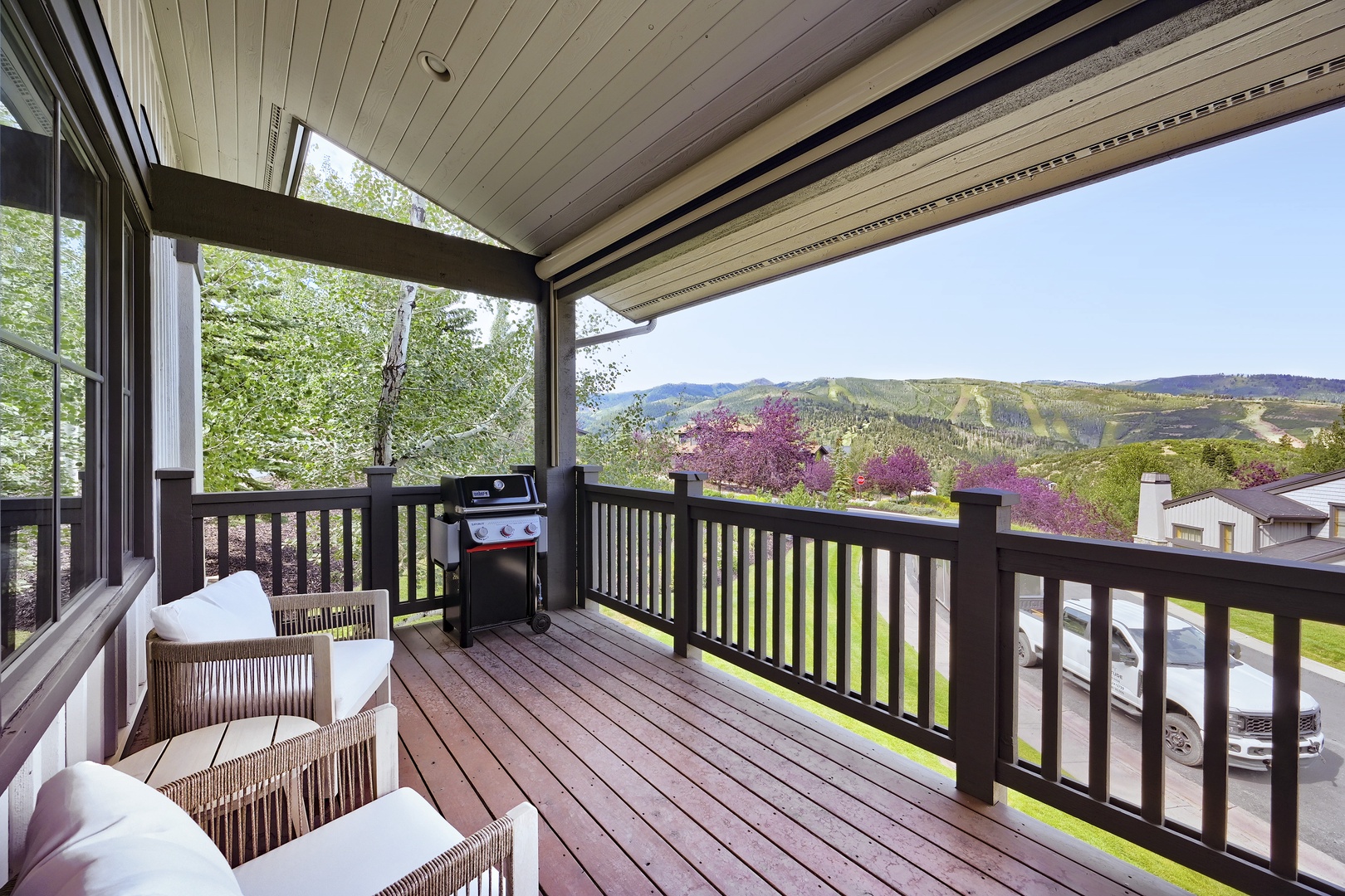 Enjoy your morning coffee on your private covered deck, where mountain views and fresh alpine air set the stage for a relaxing mountain getaway.