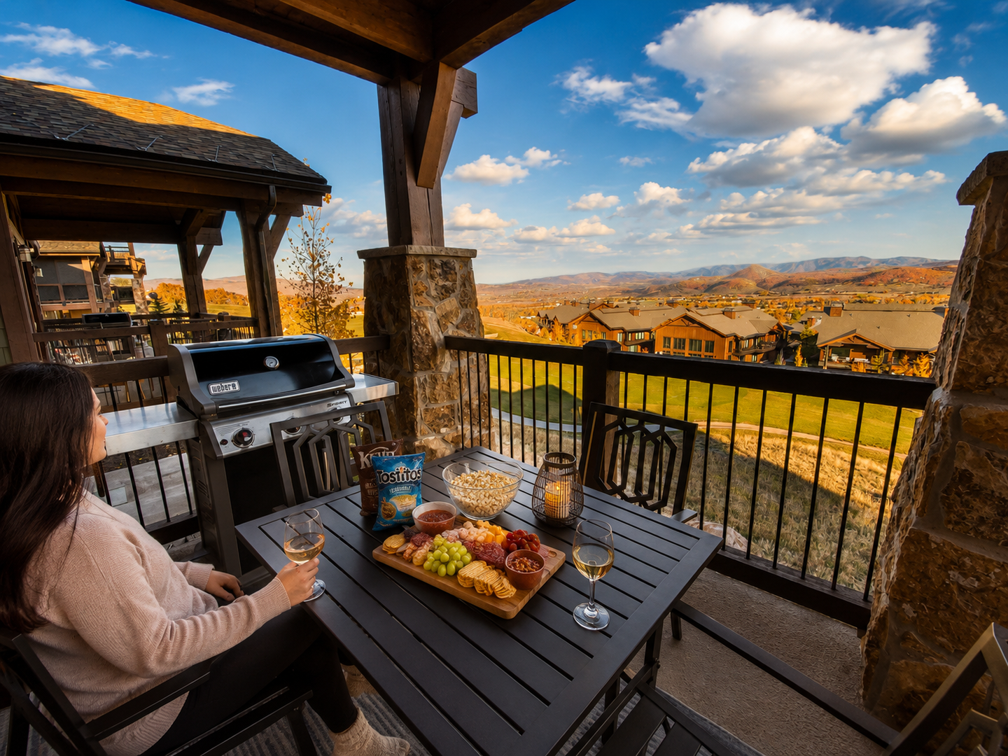 This private deck offers breathtaking, unobstructed mountain views of Canyons Resort. Relax in comfortable wicker loungers and enjoy the crisp alpine air from this elevated, sun-drenched sanctuary.