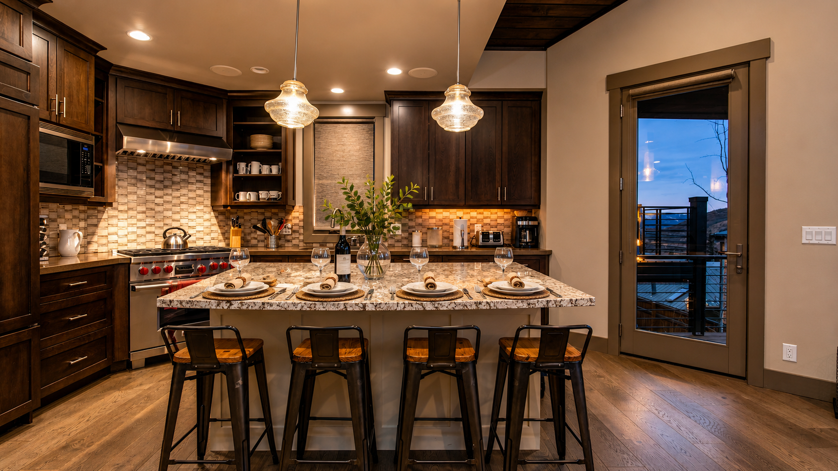 Whip up a gourmet meal in the chef's kitchen featuring a large island, sleek countertops, and a full range of cooking essentials for your Park City getaway.