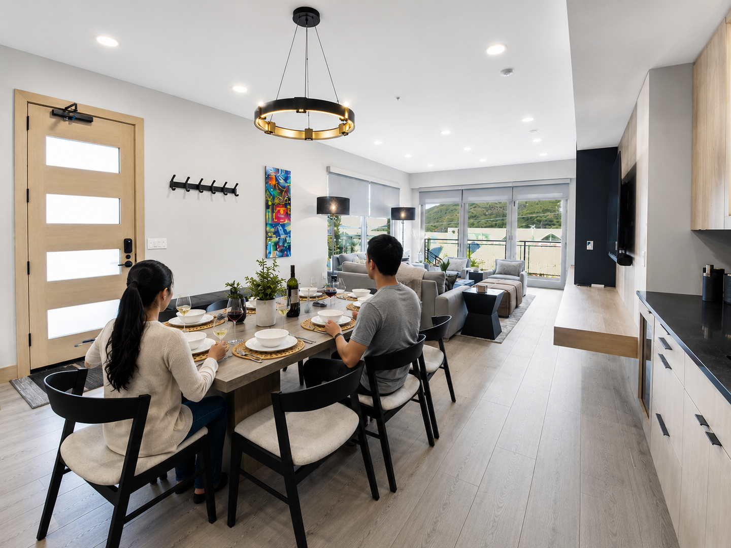 Your bright, open-concept living space flows seamlessly from dining to living area, where natural light and modern finishes create a perfect home base for your getaway.