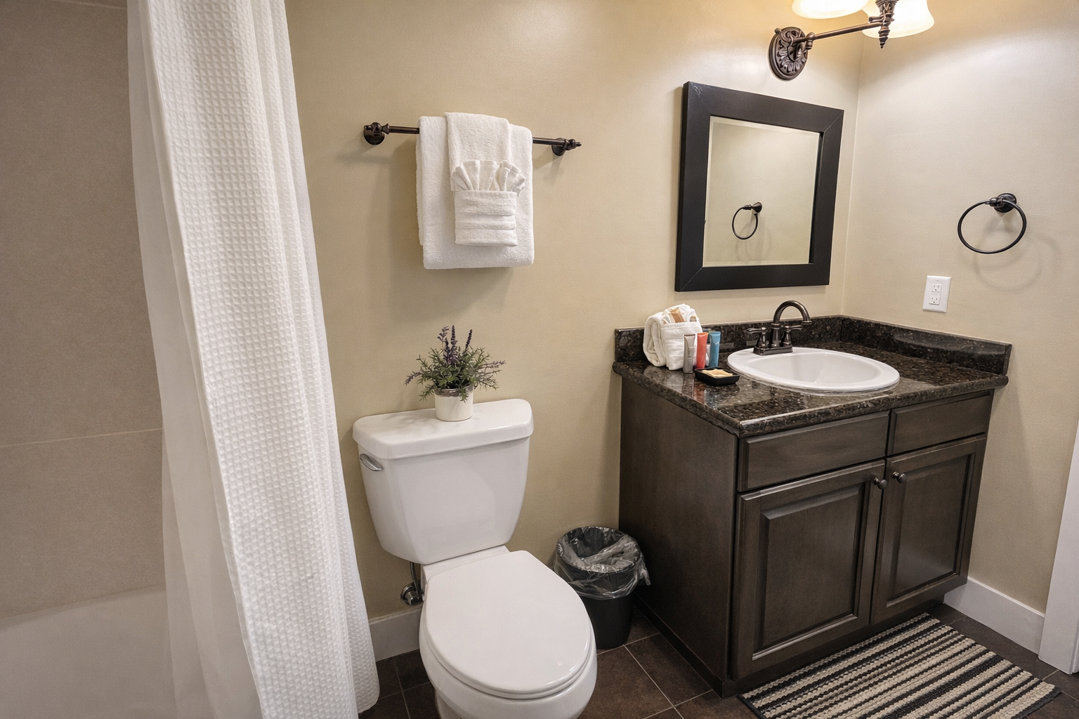 Refresh in your stylishly appointed bathroom with granite countertops, quality fixtures, and plush towels awaiting your arrival.