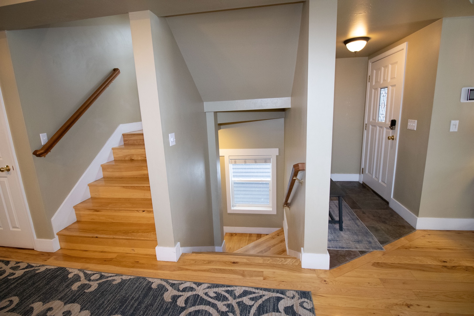 You'll love the warm wood floors and thoughtful design as you move through this welcoming multi-level home.