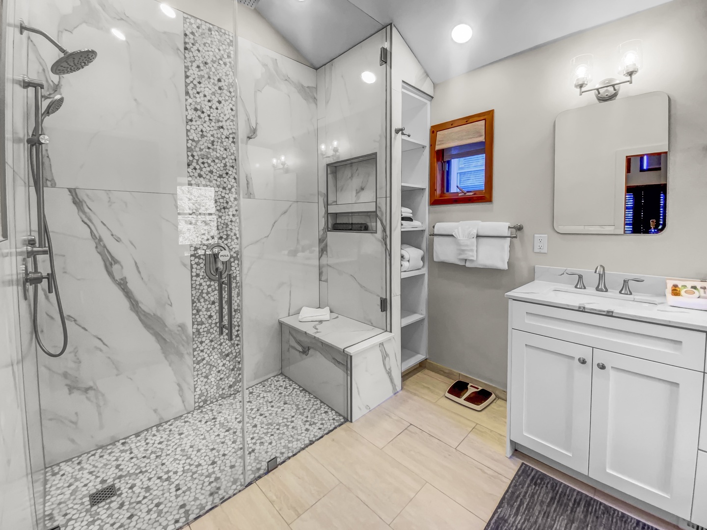 Step into your luxurious spa-like bathroom with elegant marble tiles and spacious walk-in shower for ultimate relaxation.