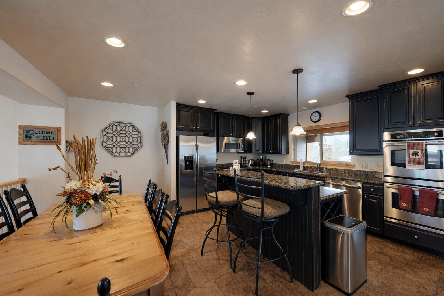 Cook memorable meals in your spacious kitchen featuring granite countertops, stainless steel appliances, and an island perfect for gathering.
