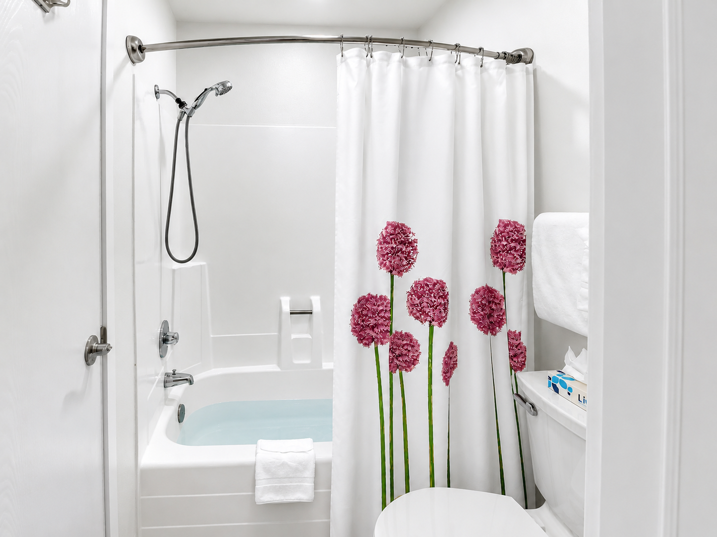 Enjoy convenience and comfort in this full bathroom, featuring a single vanity, a tub/shower combo, and all essentials for a refreshing stay.