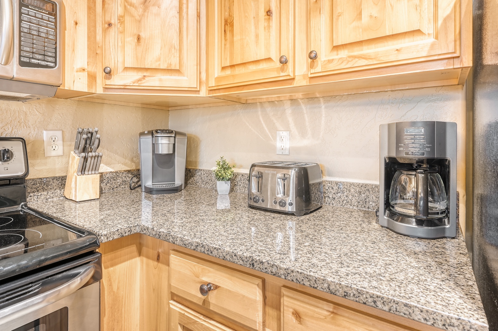Your fully equipped kitchen features granite counters, quality appliances, and everything you need to prepare delicious meals during your stay.
