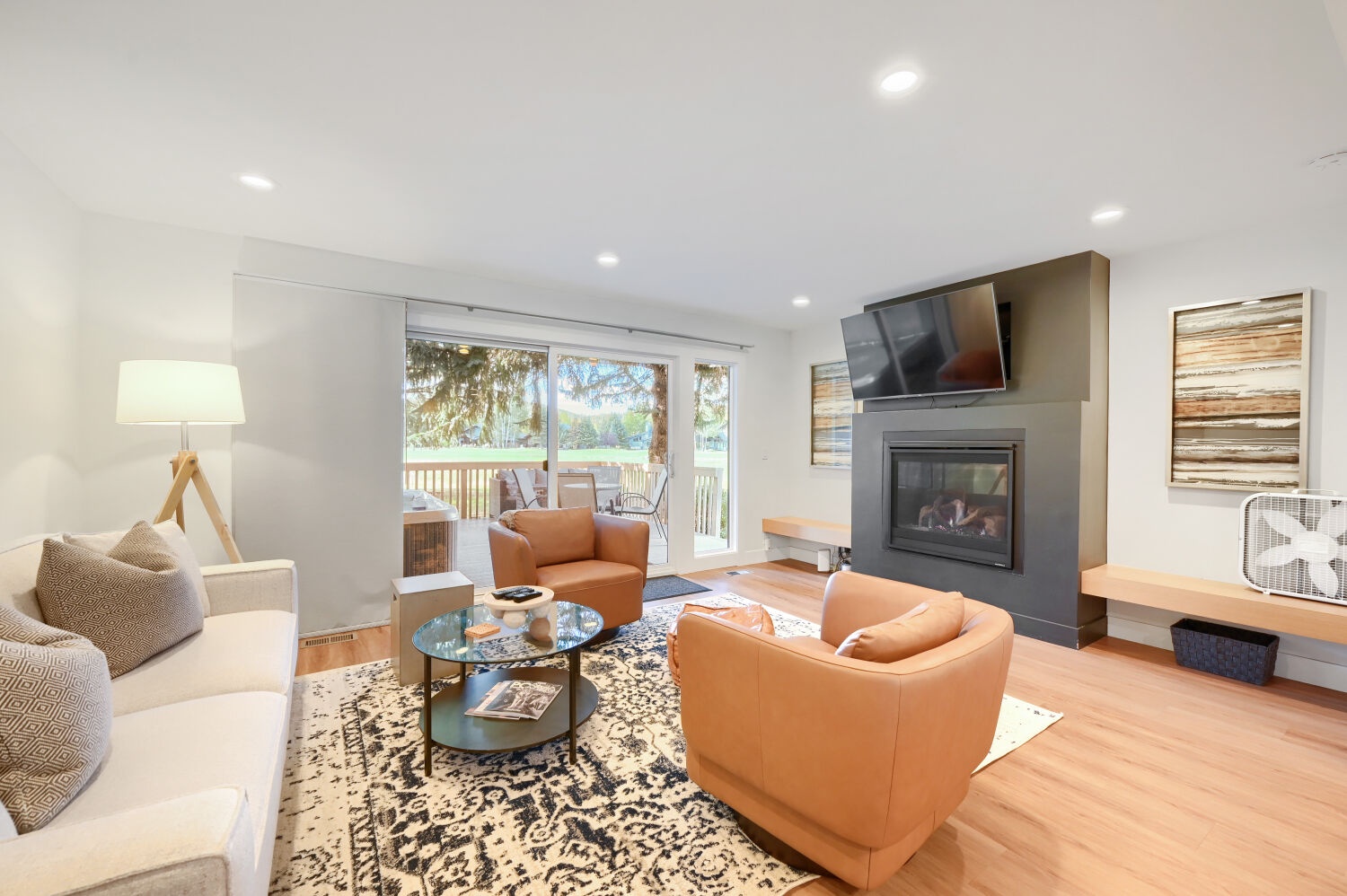 Open space living room with outside view of the balcony and natural landscape