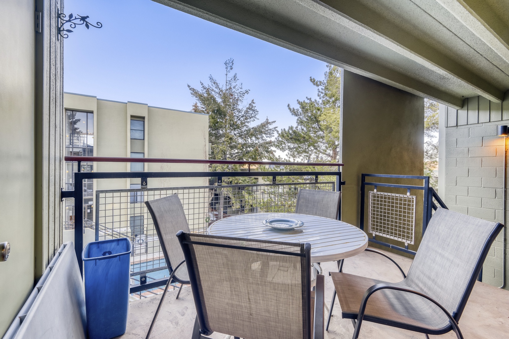 Your private balcony offers the perfect spot to enjoy morning coffee or evening meals while taking in peaceful neighborhood views.