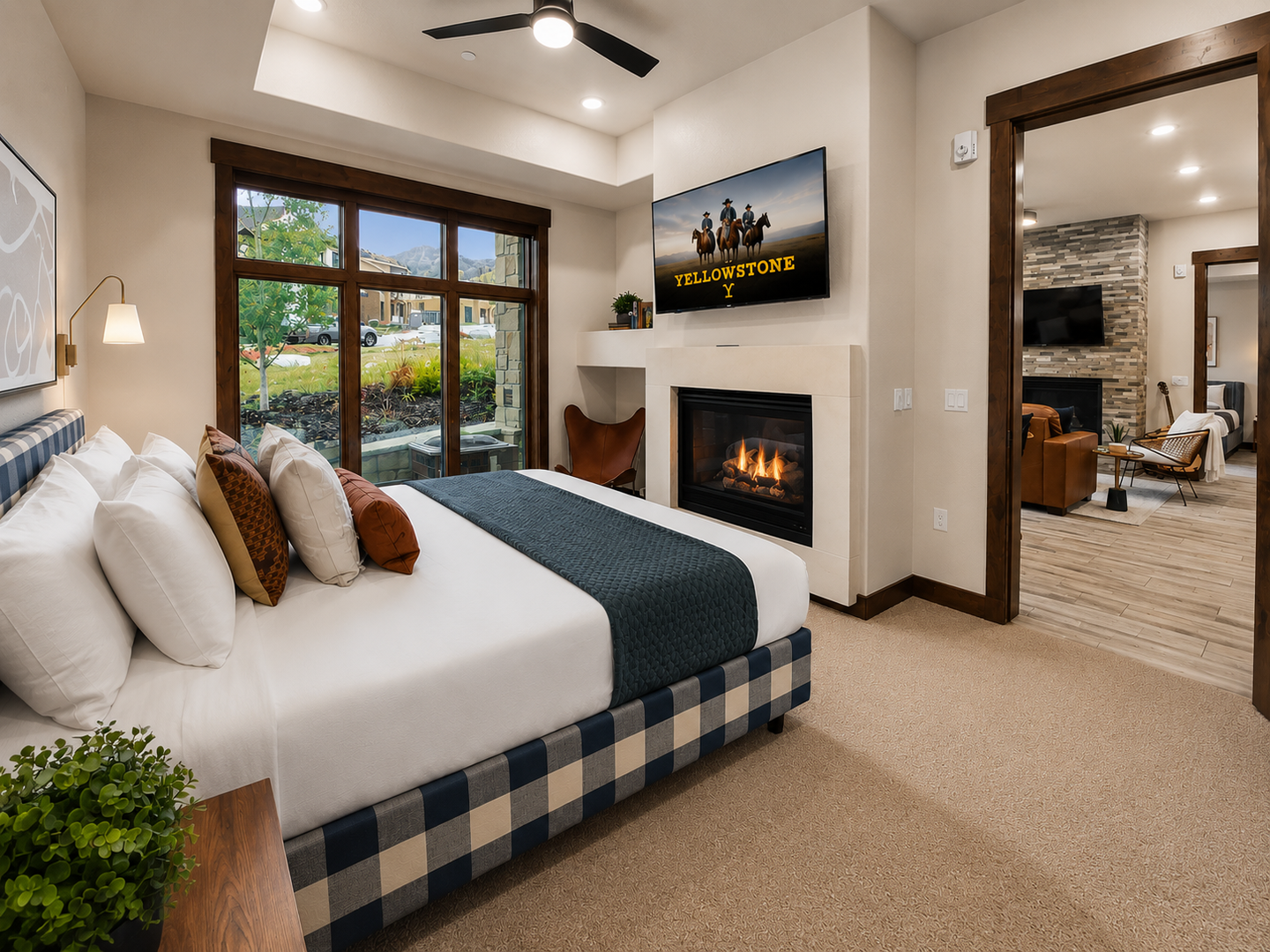 Unwind in your cozy bedroom with a plush king bed, crackling fireplace, and peaceful garden views. Stylish furnishings and modern amenities make this your personal retreat.