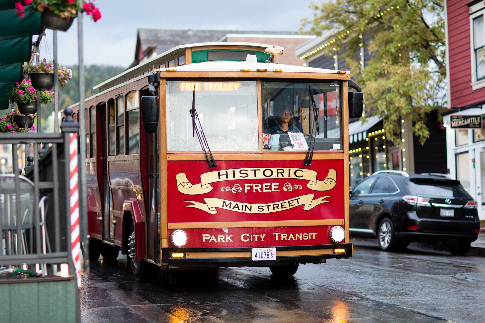 Historic free trolley provides charming transportation through Main Street's vibrant downtown district with local shops and dining.