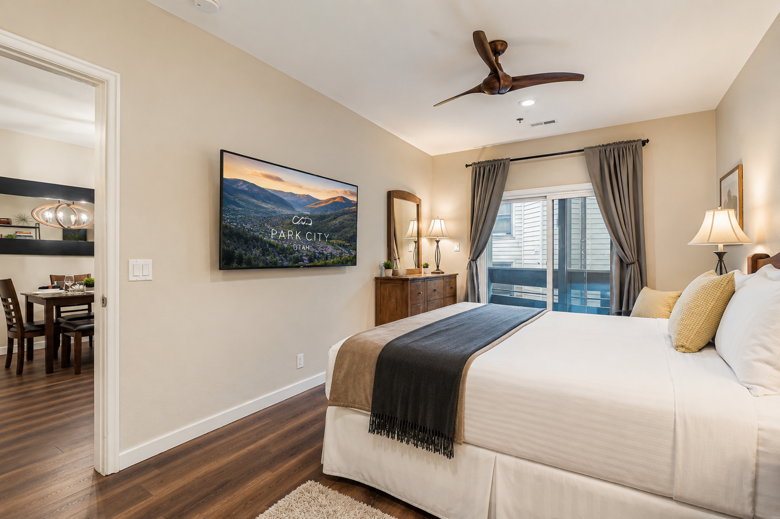 Unwind in your inviting bedroom with a plush bed, calming décor, and a private balcony—perfect for restful mornings and peaceful evenings.