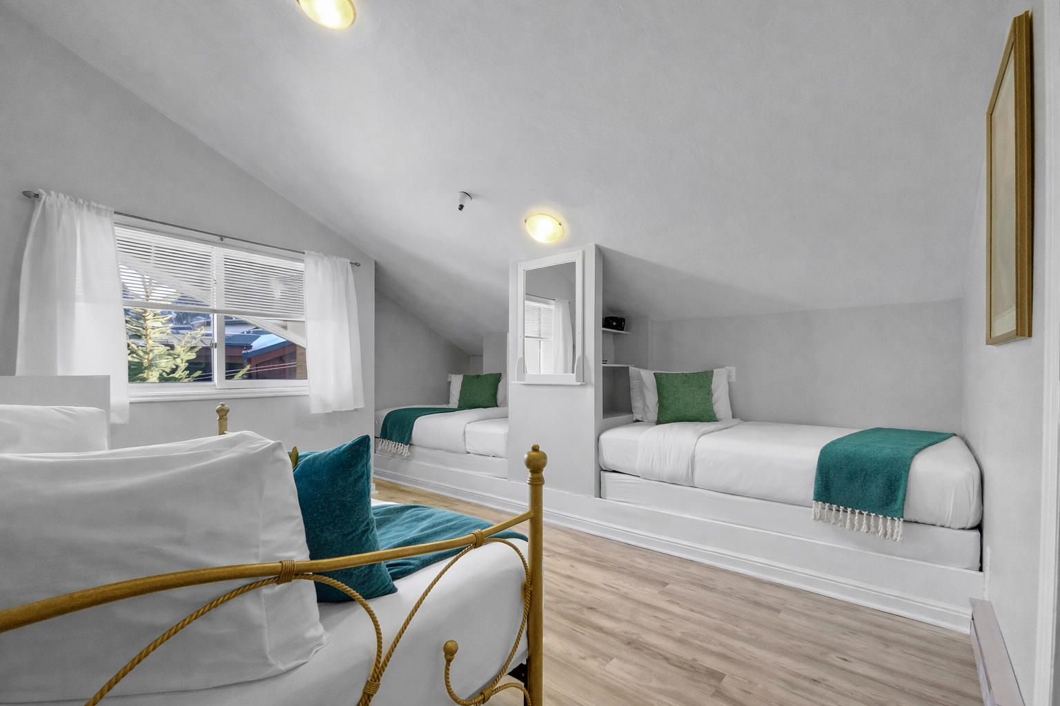 Cozy loft space with multiple built-in beds. Perfect for a group or family stay in the mountains.