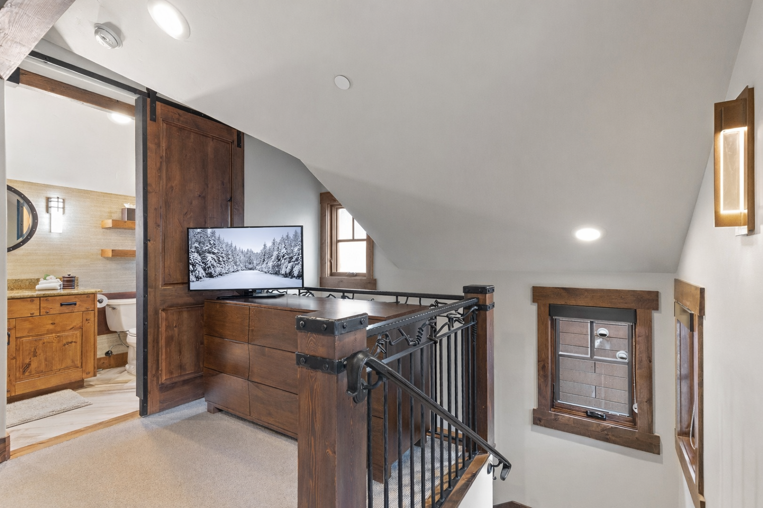 Sleep soundly in this unique bunk room, featuring 3 cozy twin beds and access to a private balcony.