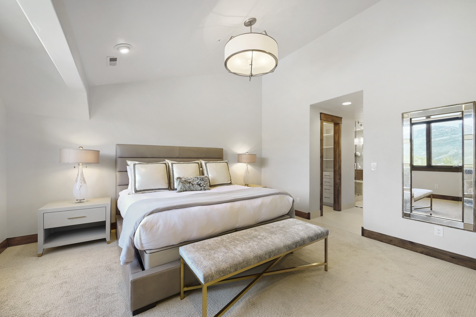 Wake up in your serene sanctuary, where soft lighting and elegant furnishings create the perfect retreat. Your private mountain views frame each morning with natural beauty.