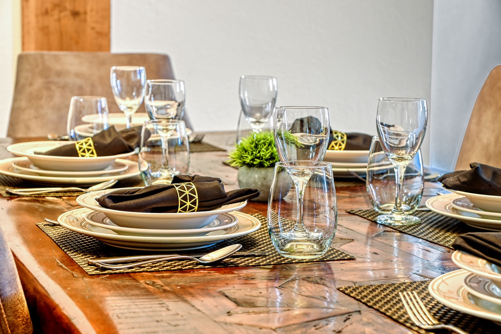 Your dining table awaits with elegant place settings, sparkling glassware, and thoughtful touches that make every meal feel special.