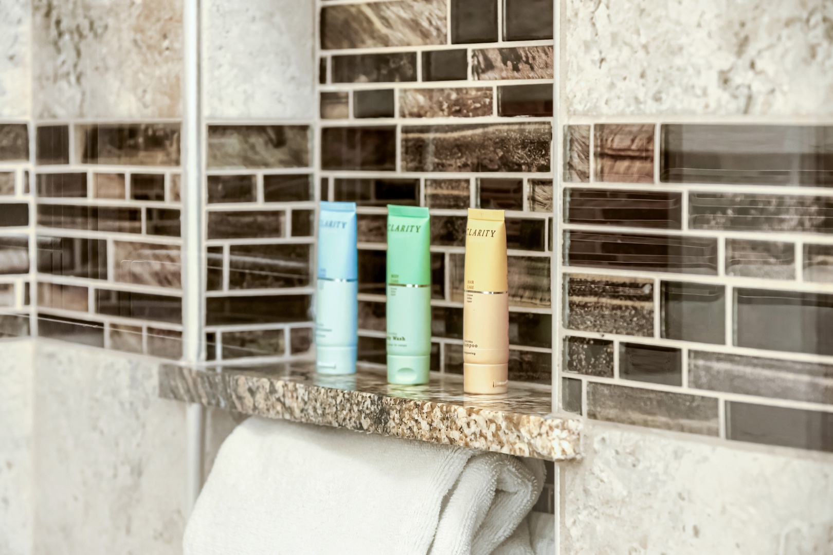 Premium bath amenities await you in this beautifully tiled bathroom, where thoughtful details and quality finishes create a spa-like retreat.