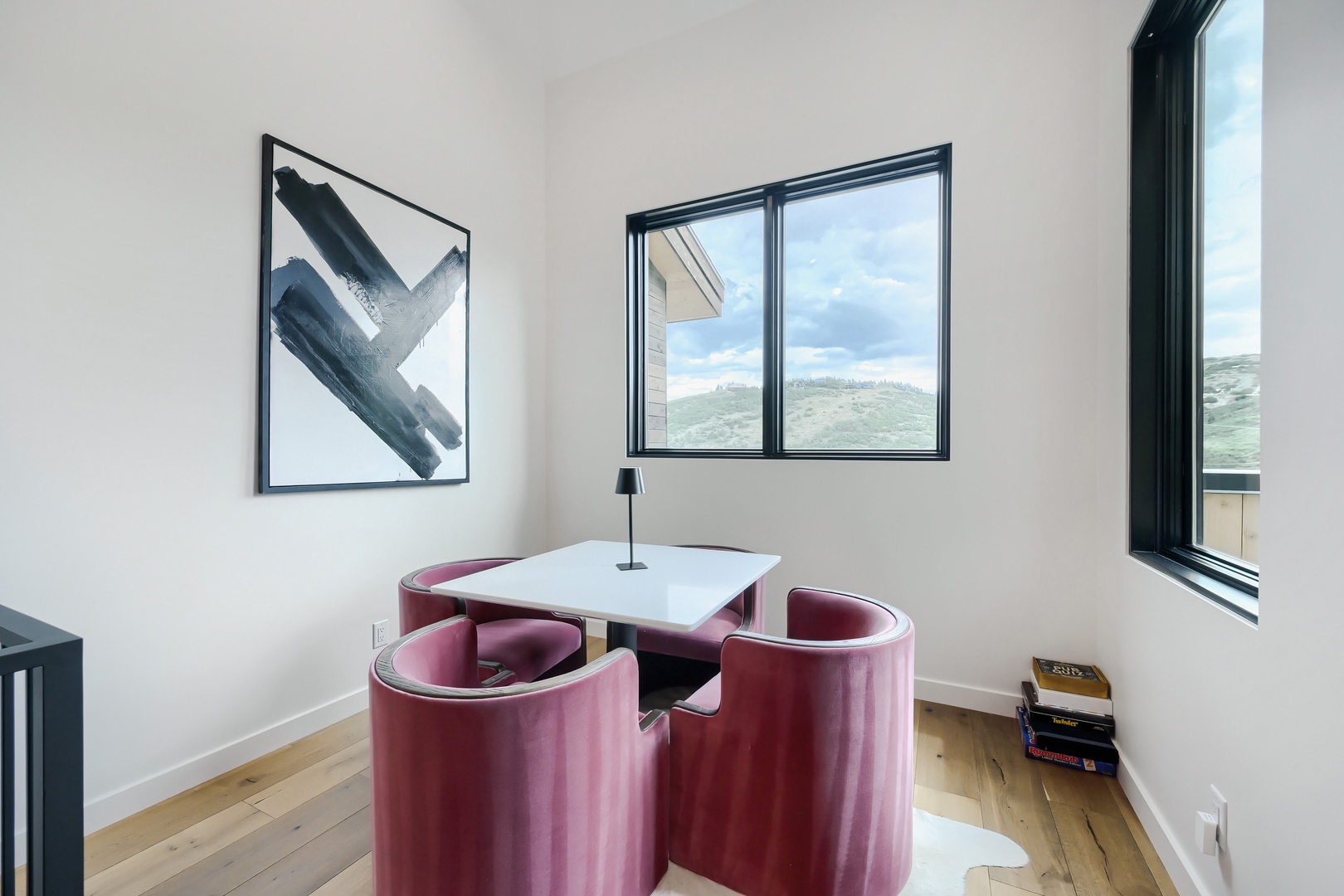 Settle into your private dining nook with a good book and captivating landscape views framing every meal. Natural light floods this intimate corner, making it perfect for morning coffee or sunset conversation.