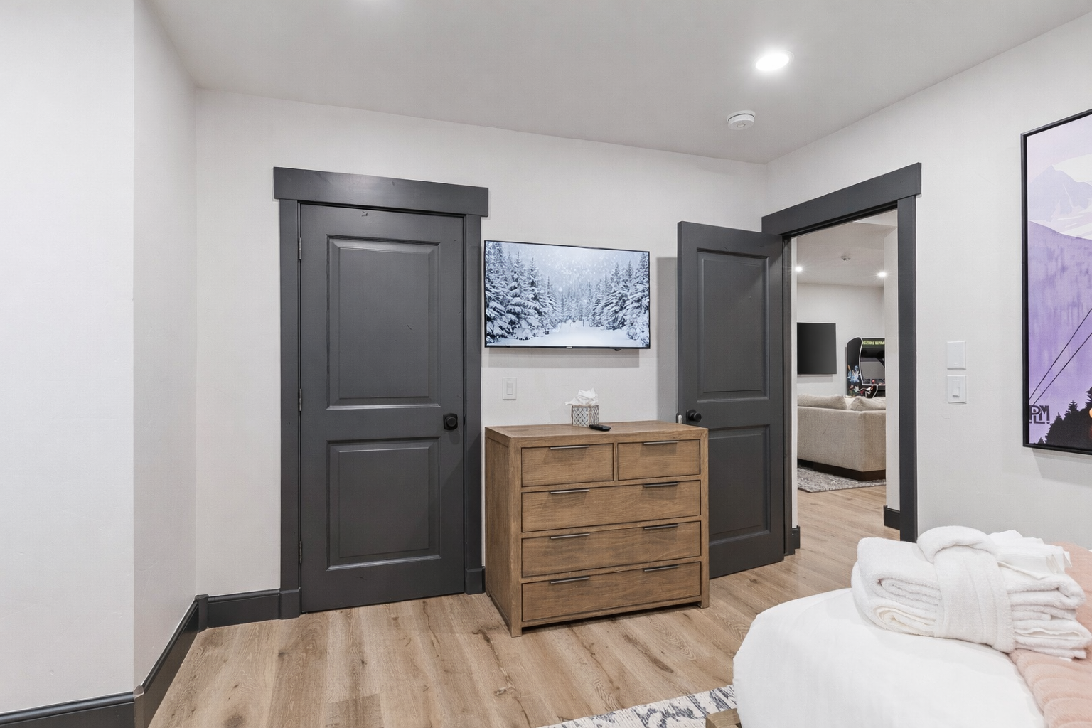 Your spacious bedroom features elegant storage and modern amenities, with a cozy ensuite just steps away for ultimate convenience.