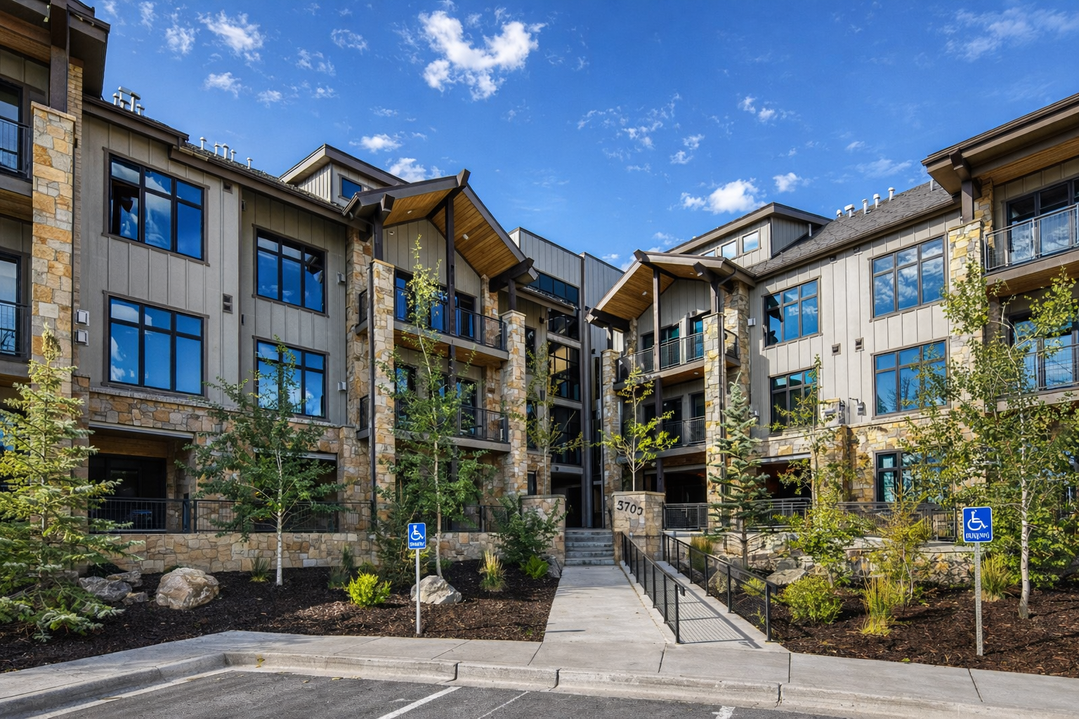 Experience ultimate mountain luxury at Blackstone Flats. This stunning top-floor condo features a sleek mountain-modern design with high-end Viking appliances, vaulted ceilings, and large windows