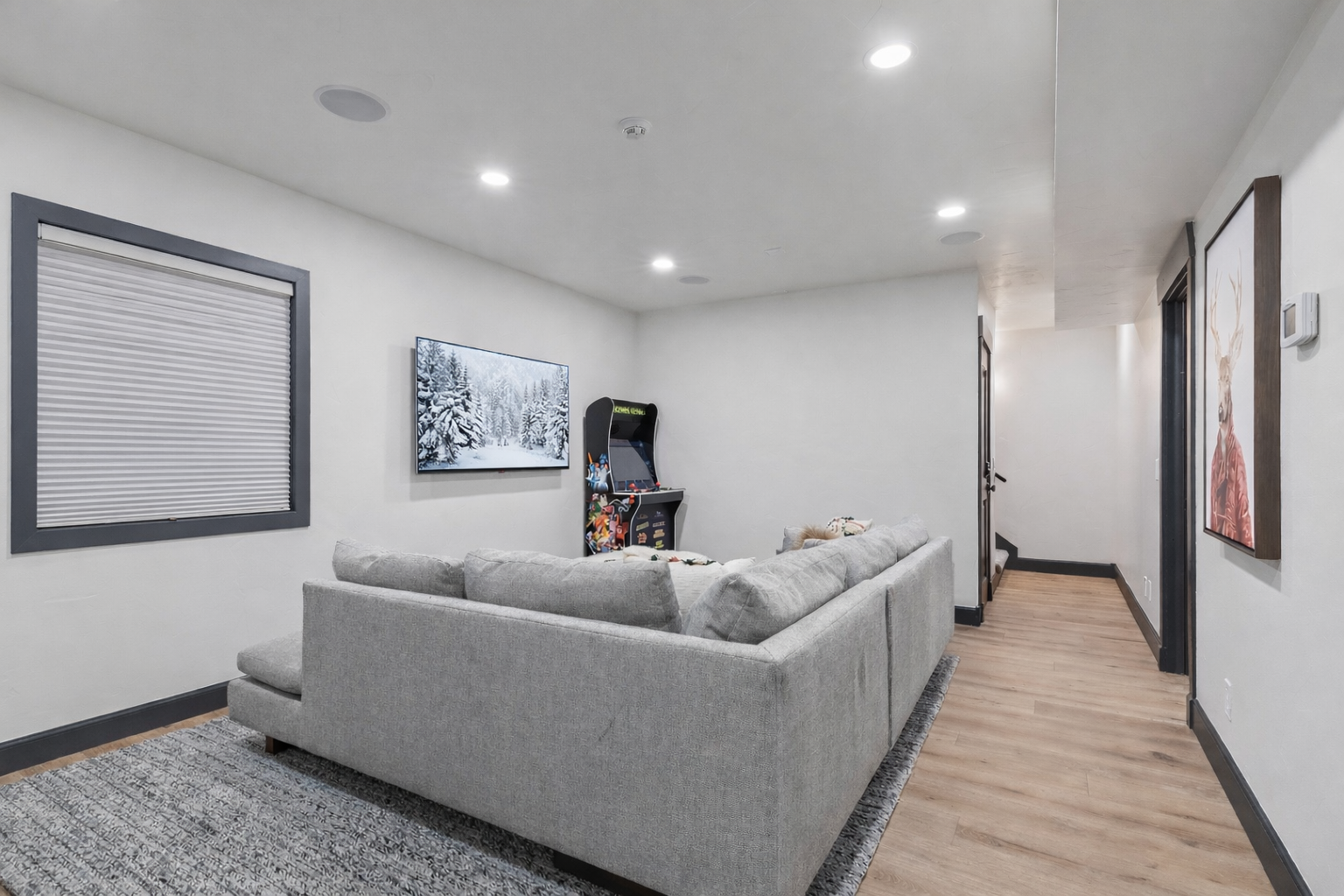 Unwind in your private entertainment lounge with plush seating, arcade games, and modern comforts for the perfect game night.