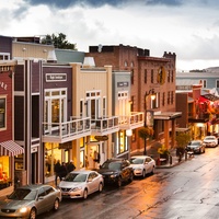 Charming historic downtown area near the property features classic brick buildings and local businesses along quiet streets.