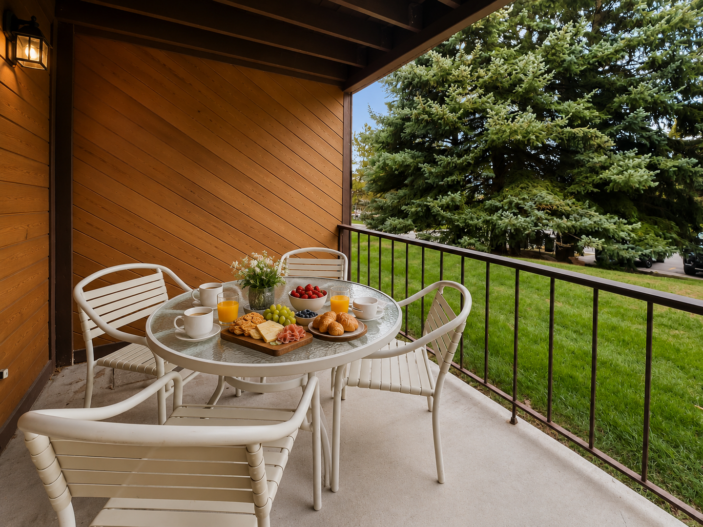 Start your mornings on your private balcony with fresh fruit, juice, and pastries while taking in peaceful garden views framed by lush greenery.