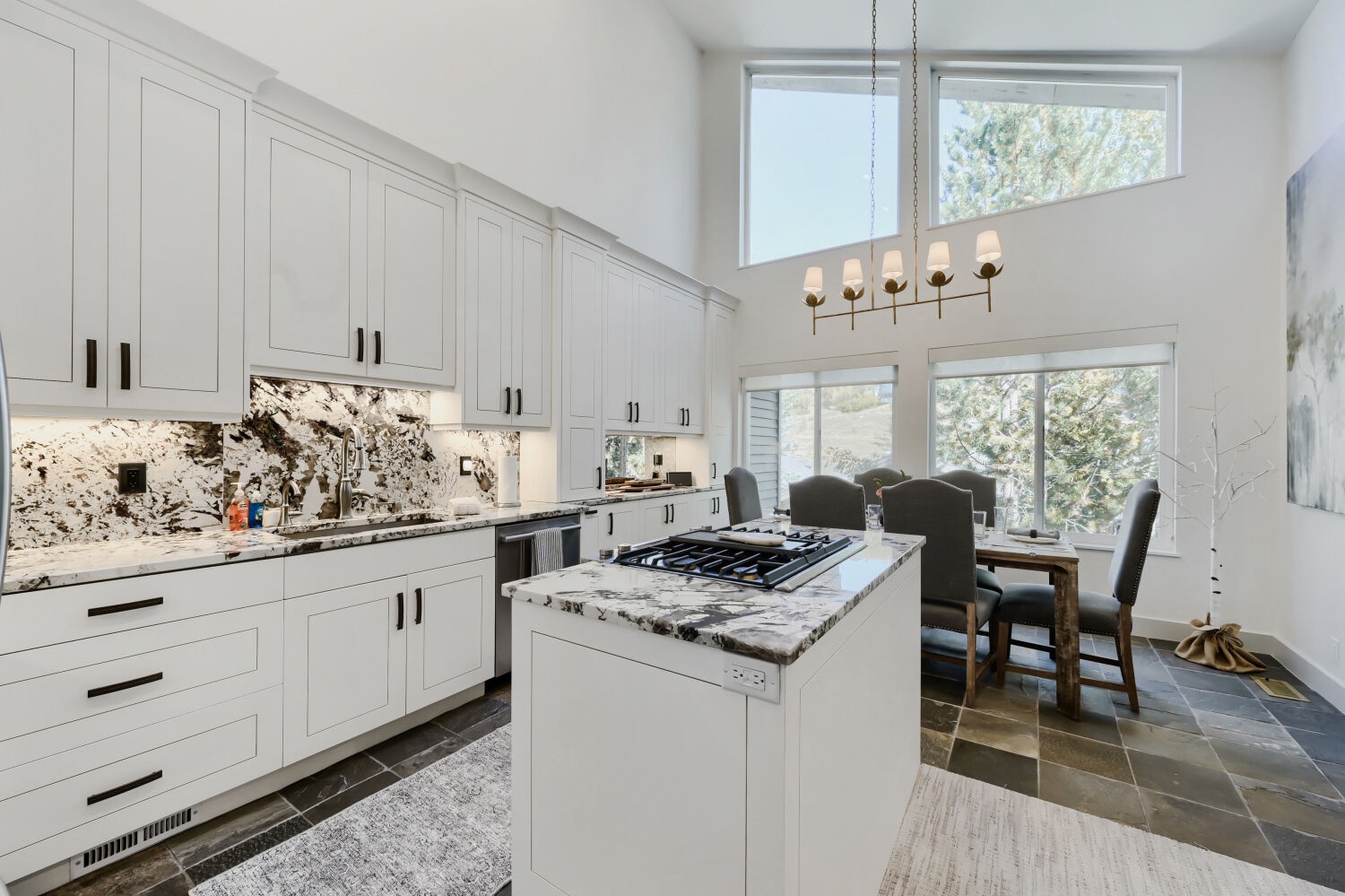 Full functioning kitchen with large island and table