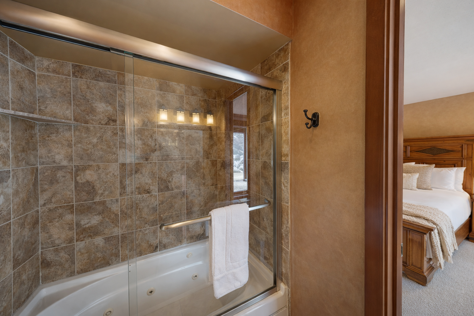 Enjoy our spacious and well-appointed private bathroom. Features include a large granite vanity, full tub/shower combo, and plush towels for a relaxing stay.