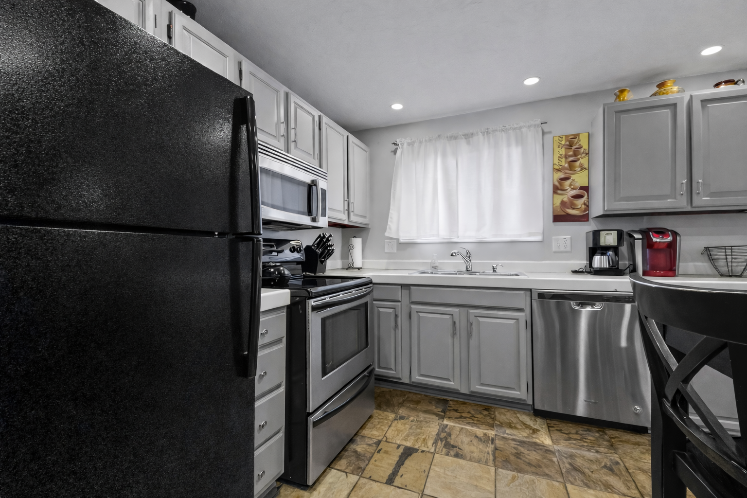Your fully equipped kitchen features modern appliances, granite counters, and everything you need to create delicious home-cooked meals during your stay.