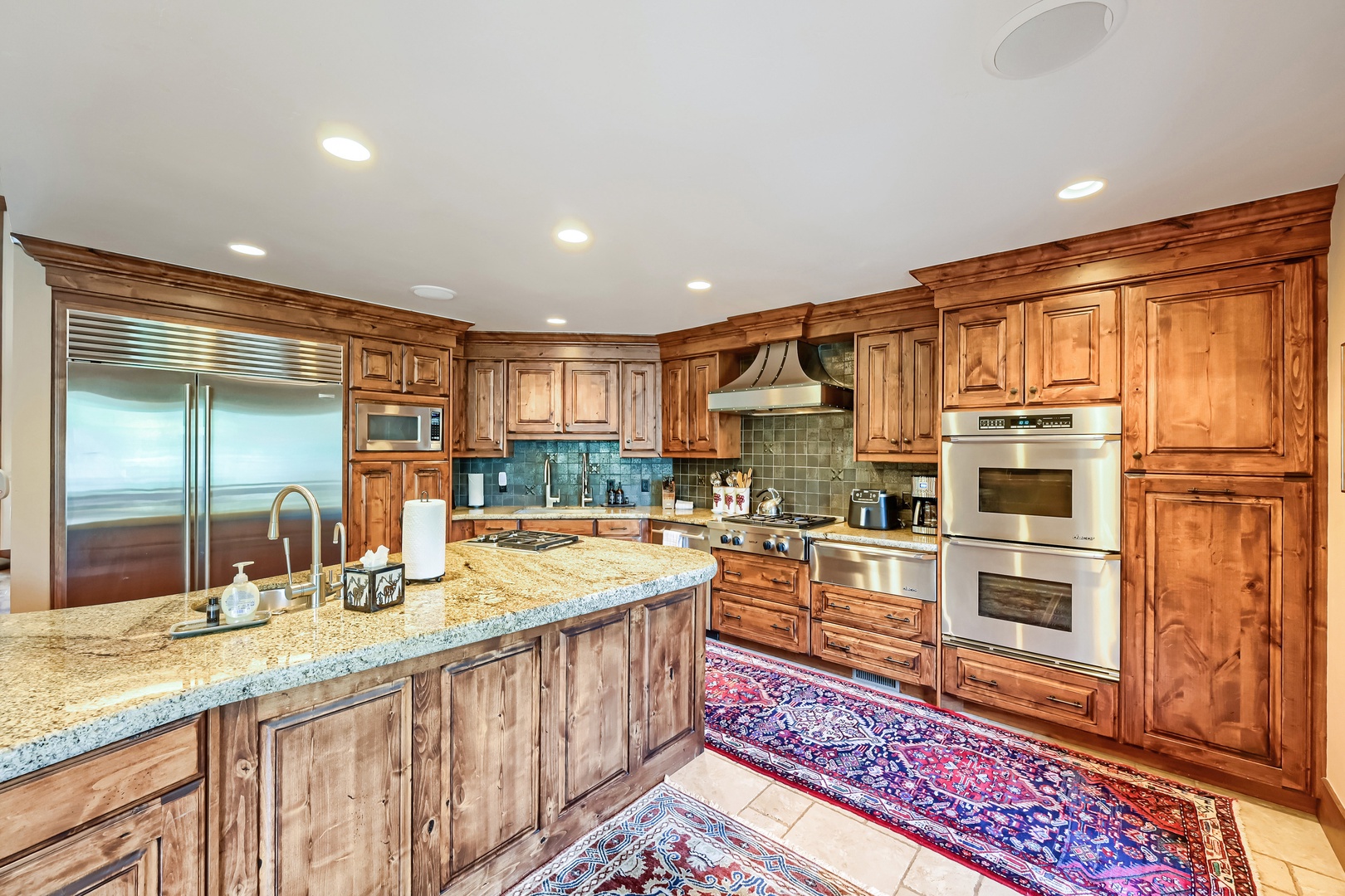 Step into your dream kitchen with rich wood cabinetry, gleaming granite counters, and top-tier stainless appliances ready for memorable meals and warm gatherings.