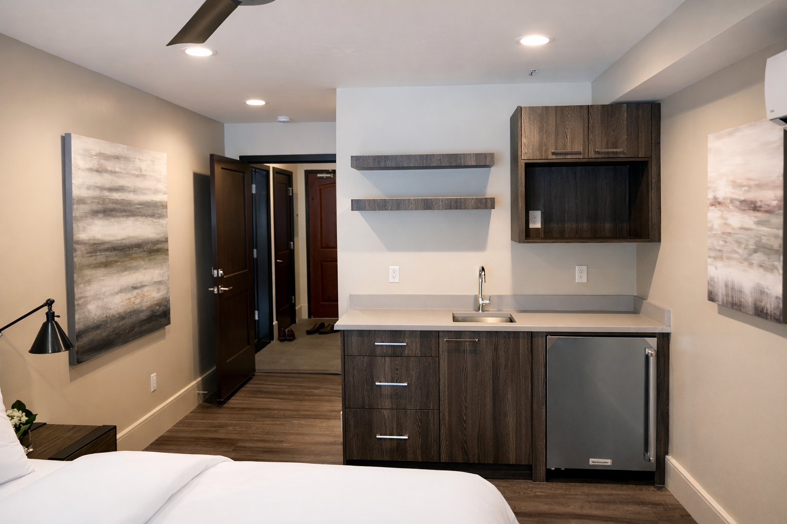 Luxury mountain escape! Modern bedroom suite with a king bed, kitchen, and balcony views. Easy access to skiing, hiking, and town.