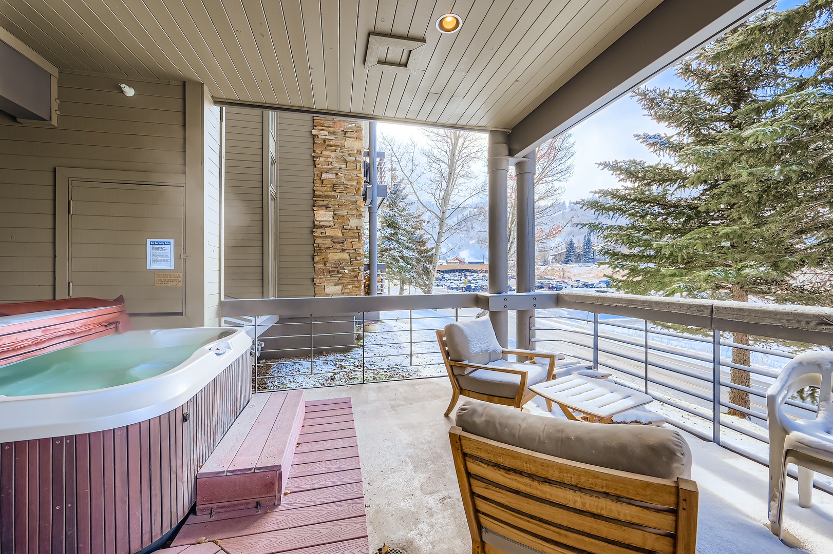 Soak in your private hot tub on the covered terrace, framed by mountain views and crisp alpine air—your perfect retreat after a day exploring.