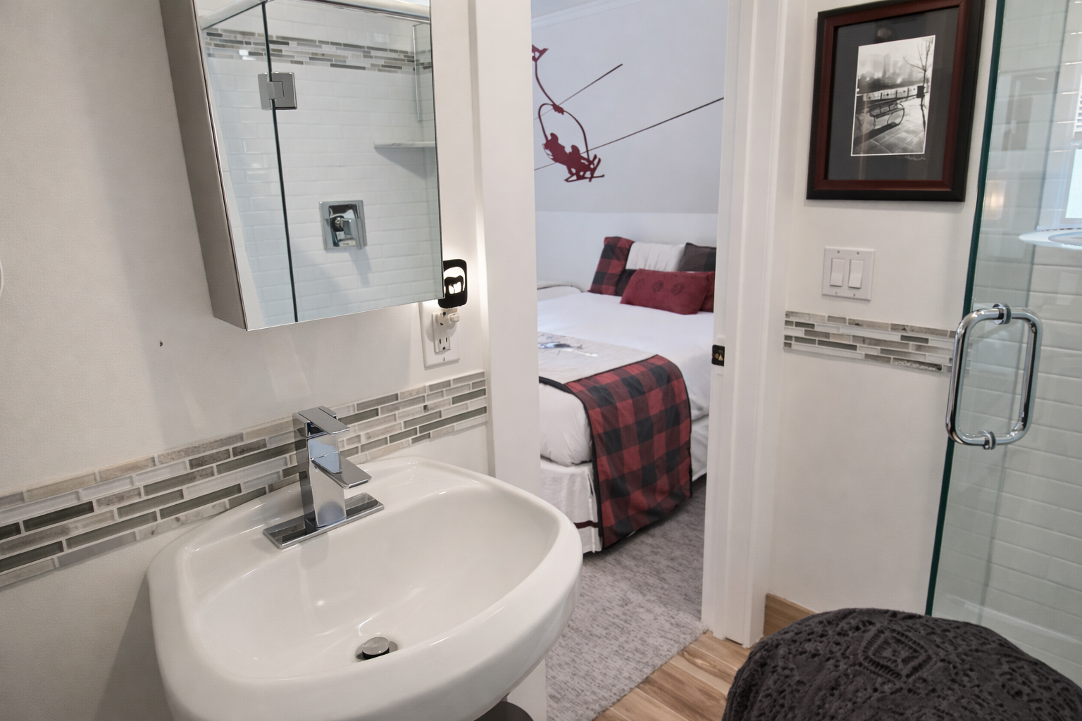 Your ensuite bathroom features modern fixtures and stylish tile work, perfectly connected to your cozy bedroom retreat.