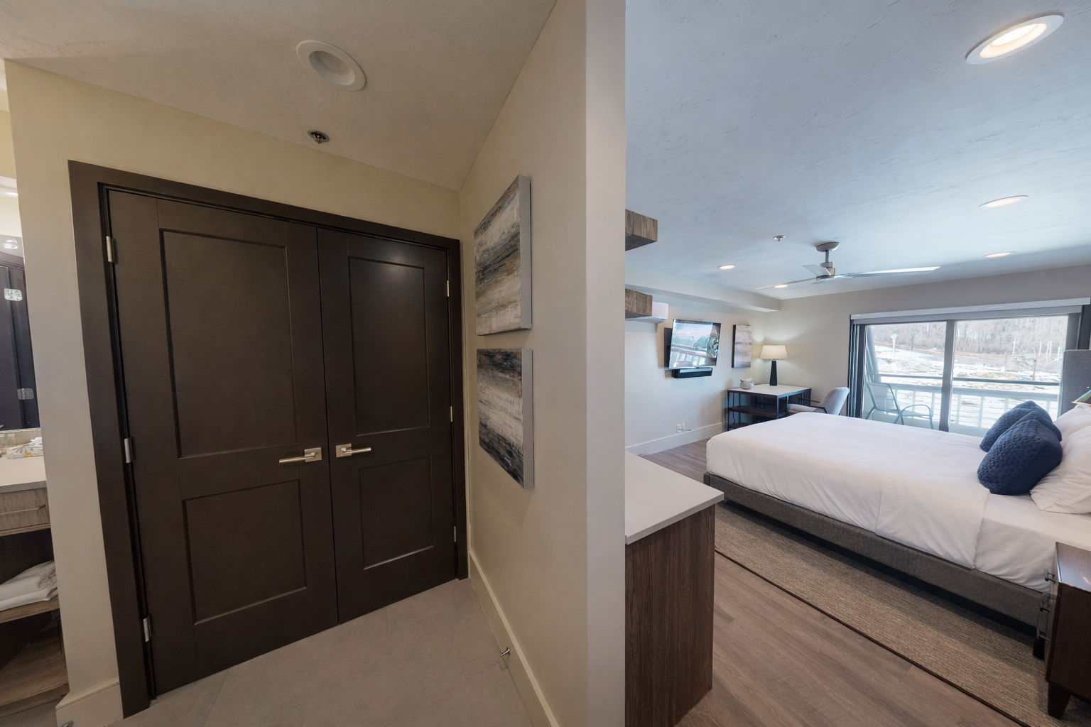 Your spacious bedroom features modern furnishings, crisp linens, and thoughtful touches that create a serene retreat after busy days exploring.