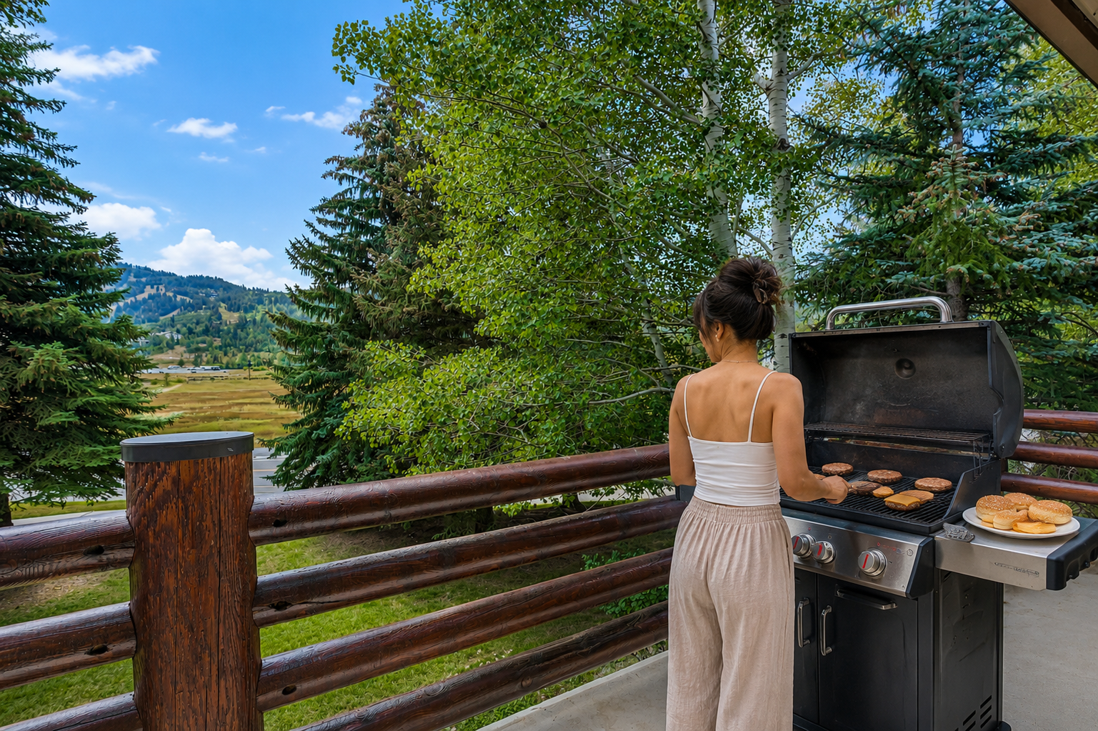 Grill your favorite meals on the private deck overlooking stunning mountain and valley views—perfect for unforgettable outdoor dining moments.