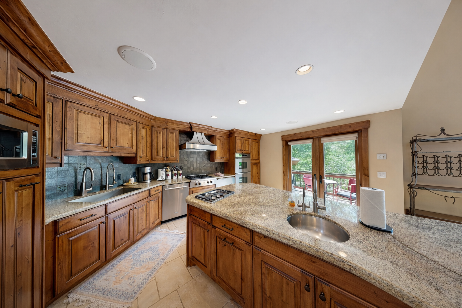 Whip up a feast in our chef's kitchen, complete with a large granite island, stainless steel appliances, and all the essentials for memorable meals.