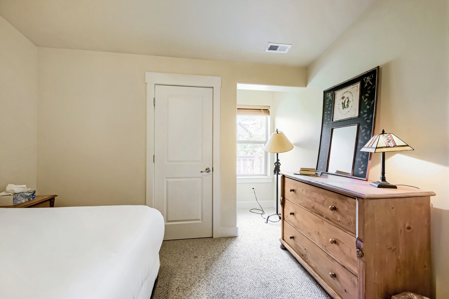 Your peaceful bedroom retreat features soft linens, warm lighting, and thoughtful furnishings to help you unwind after a day of adventure.