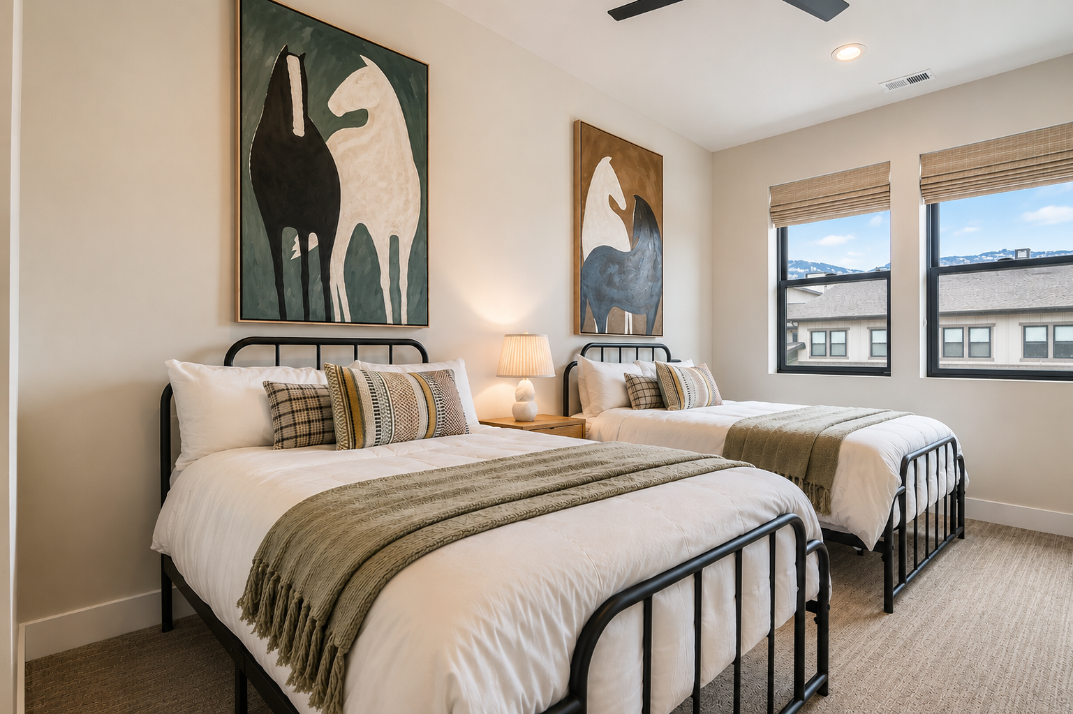 Two plush beds await in your cozy bedroom, featuring calming artwork and natural light. Sink into crisp linens, soft throws, and supportive pillows for restful nights during your stay.