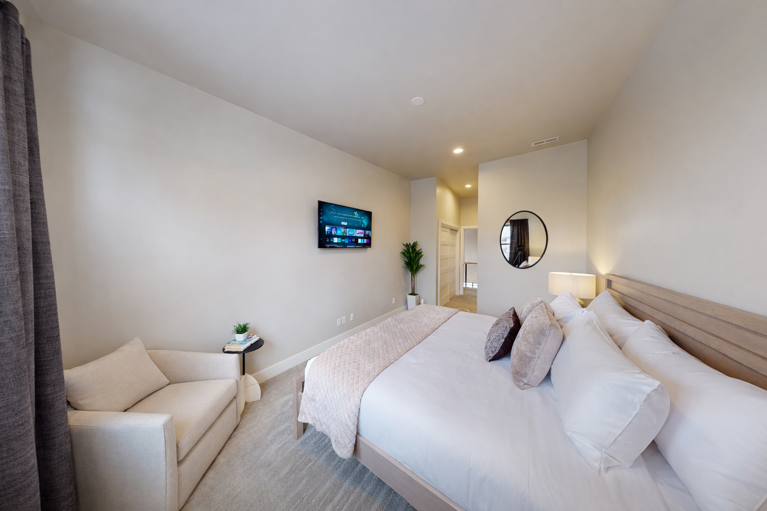 Sink into your private sanctuary with plush bedding, streaming entertainment, and cozy seating area for ultimate relaxation.