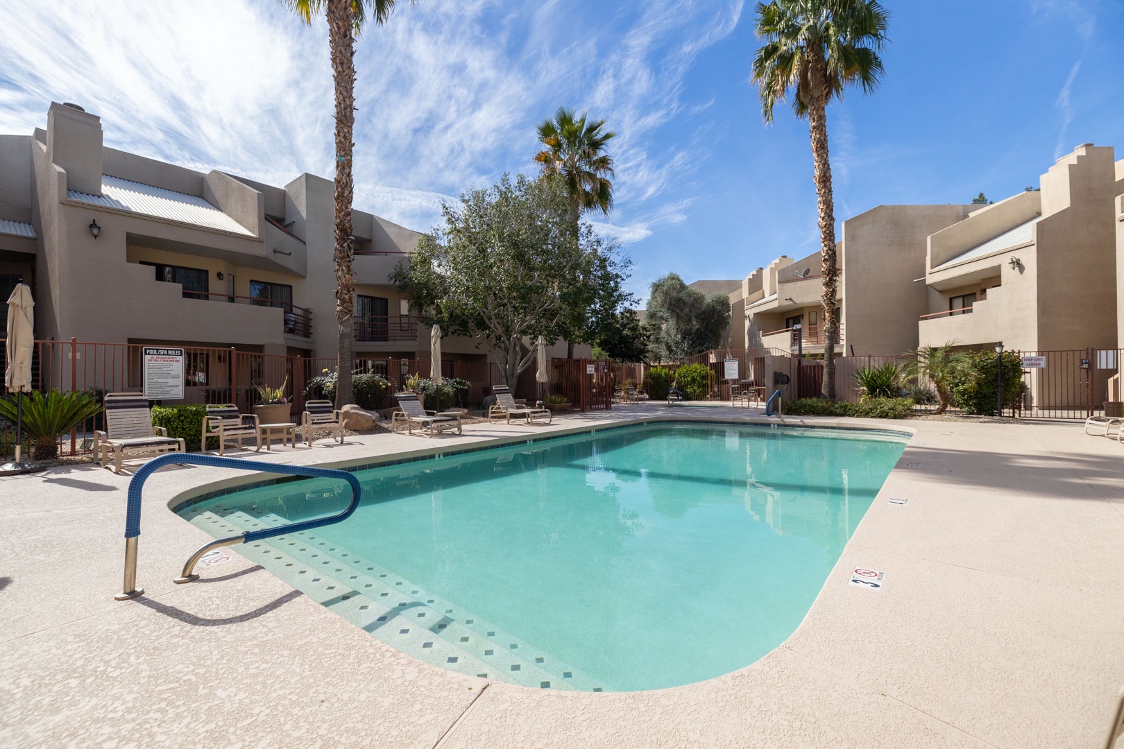 Dive into crystal-clear waters in the heated pool