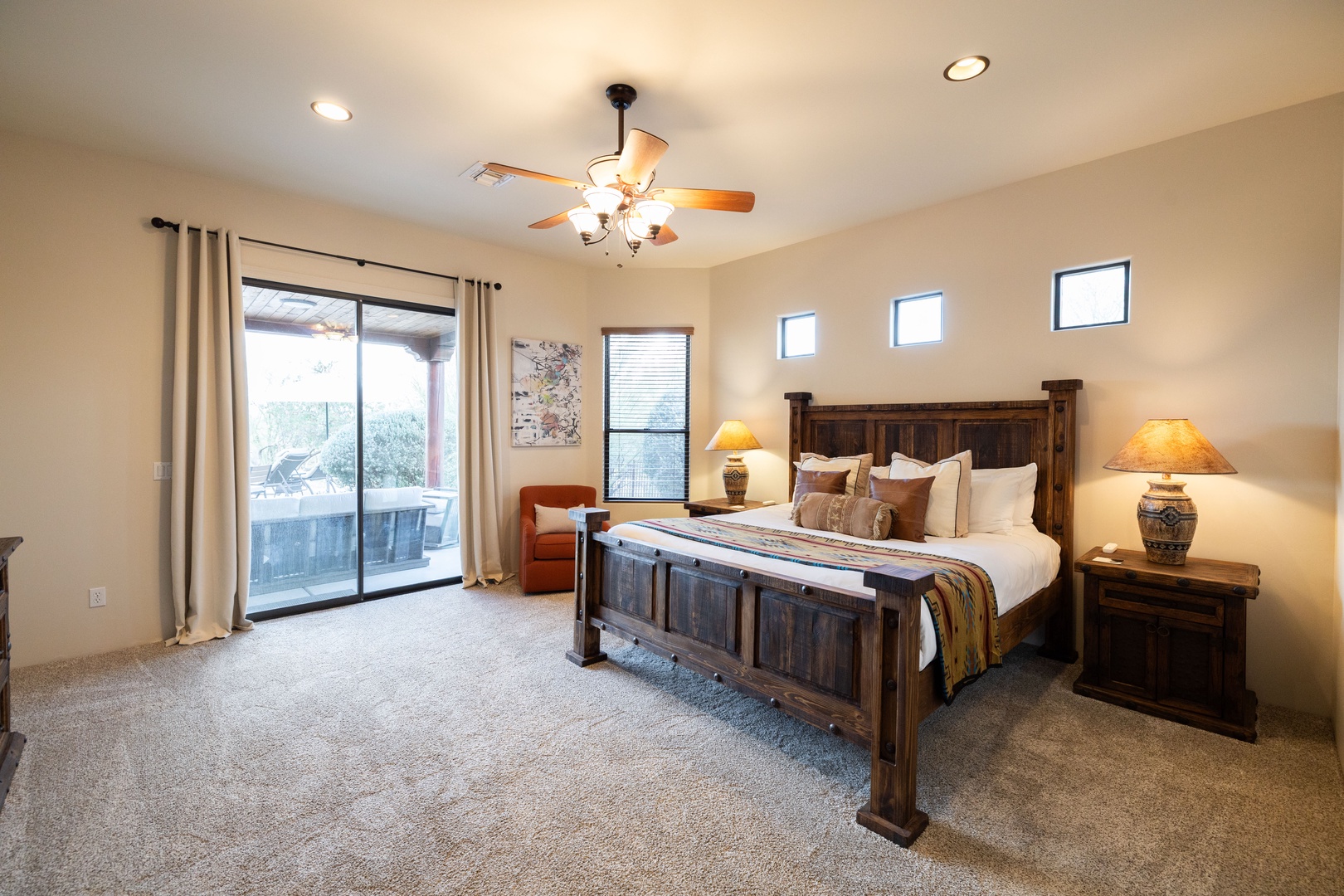 A true master bedroom retreat, with king bed and TV, en-suite bath and direct pation access
