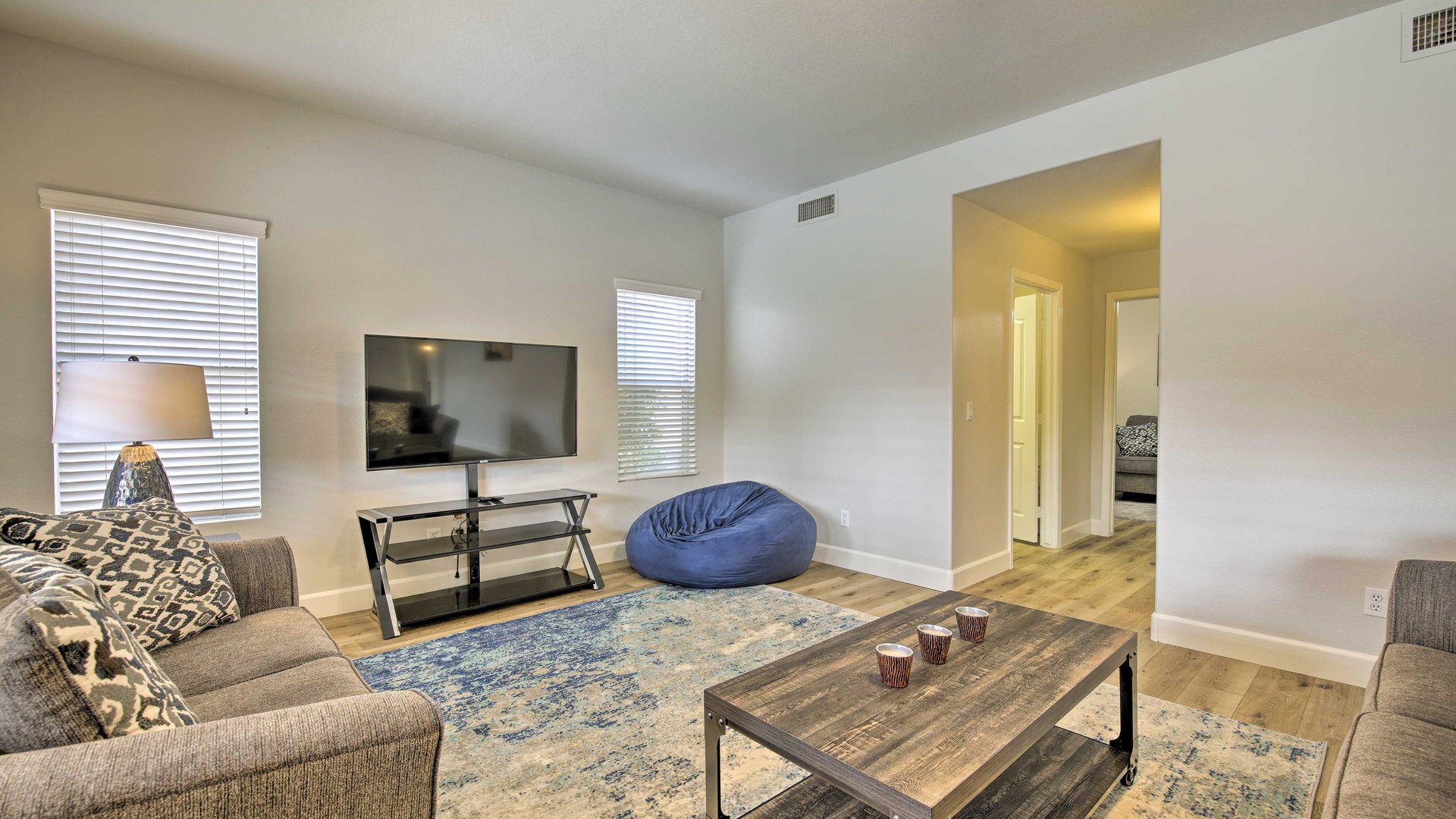 Unwind in your bright living room with comfy seating