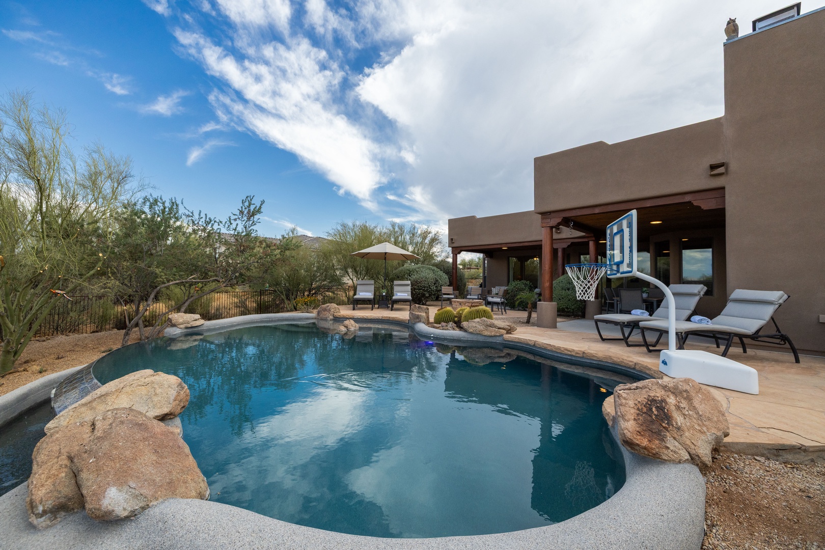 Sparkling pool with basketball hoop