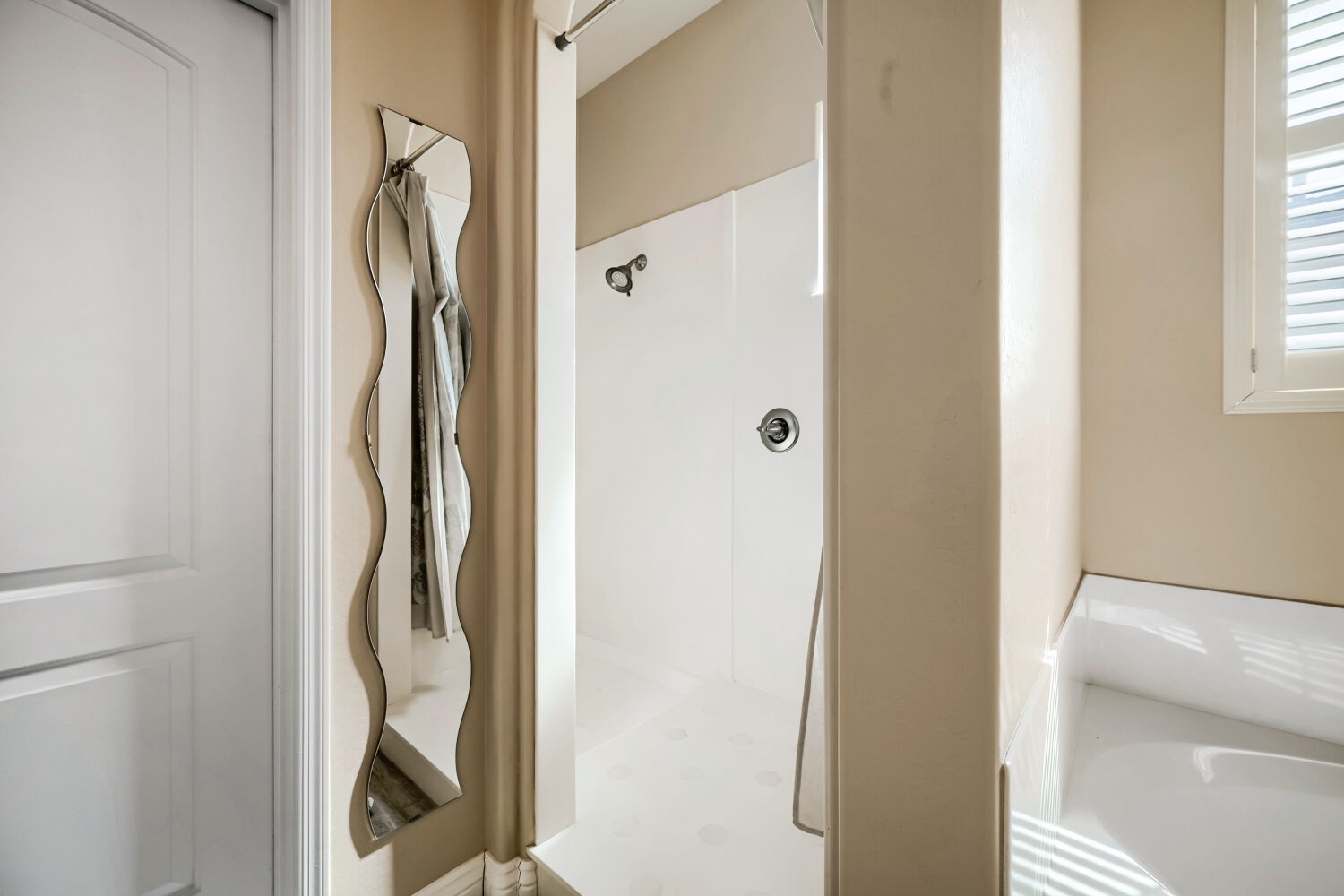 Step into your bright, spotlessly clean bathroom after a day of exploring. A refreshing shower awaits, with fluffy towels and everything you need to feel at home.