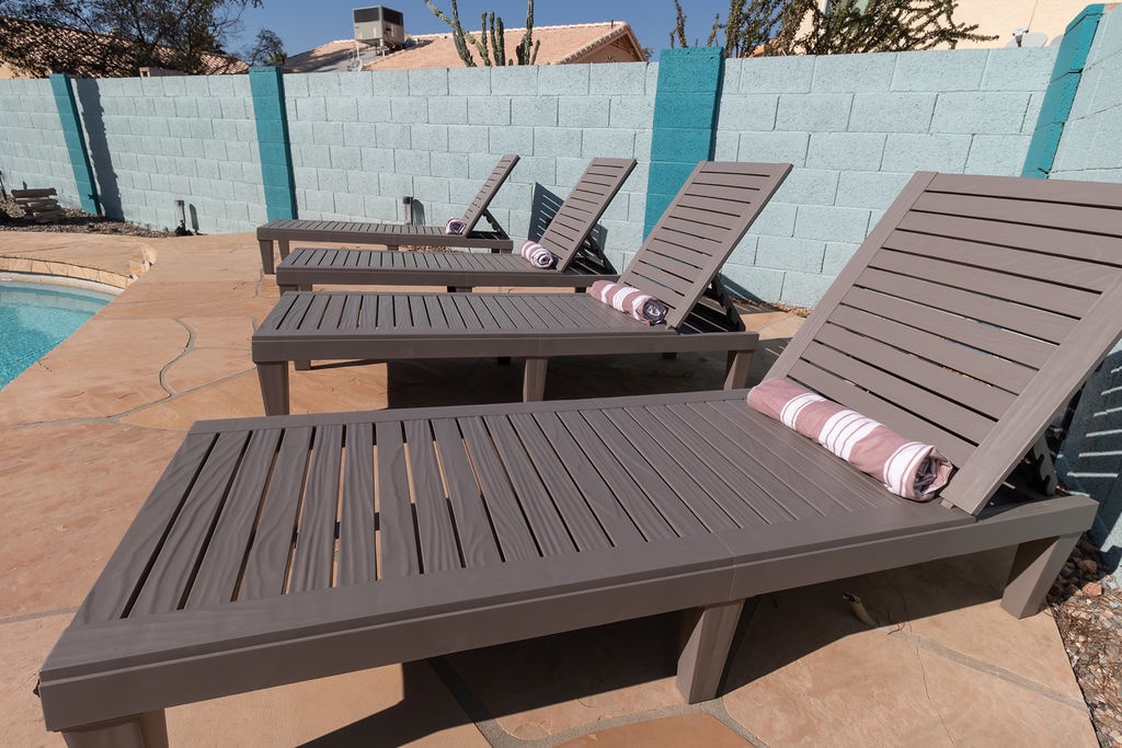 Soak up the sun on comfortable loungers by your private pool, with fresh towels waiting for your perfect poolside afternoon.