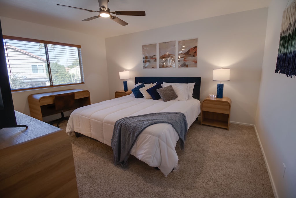 Drift off to peaceful sleep in your beautifully appointed bedroom, where soft linens and calming decor create the perfect sanctuary for rest.