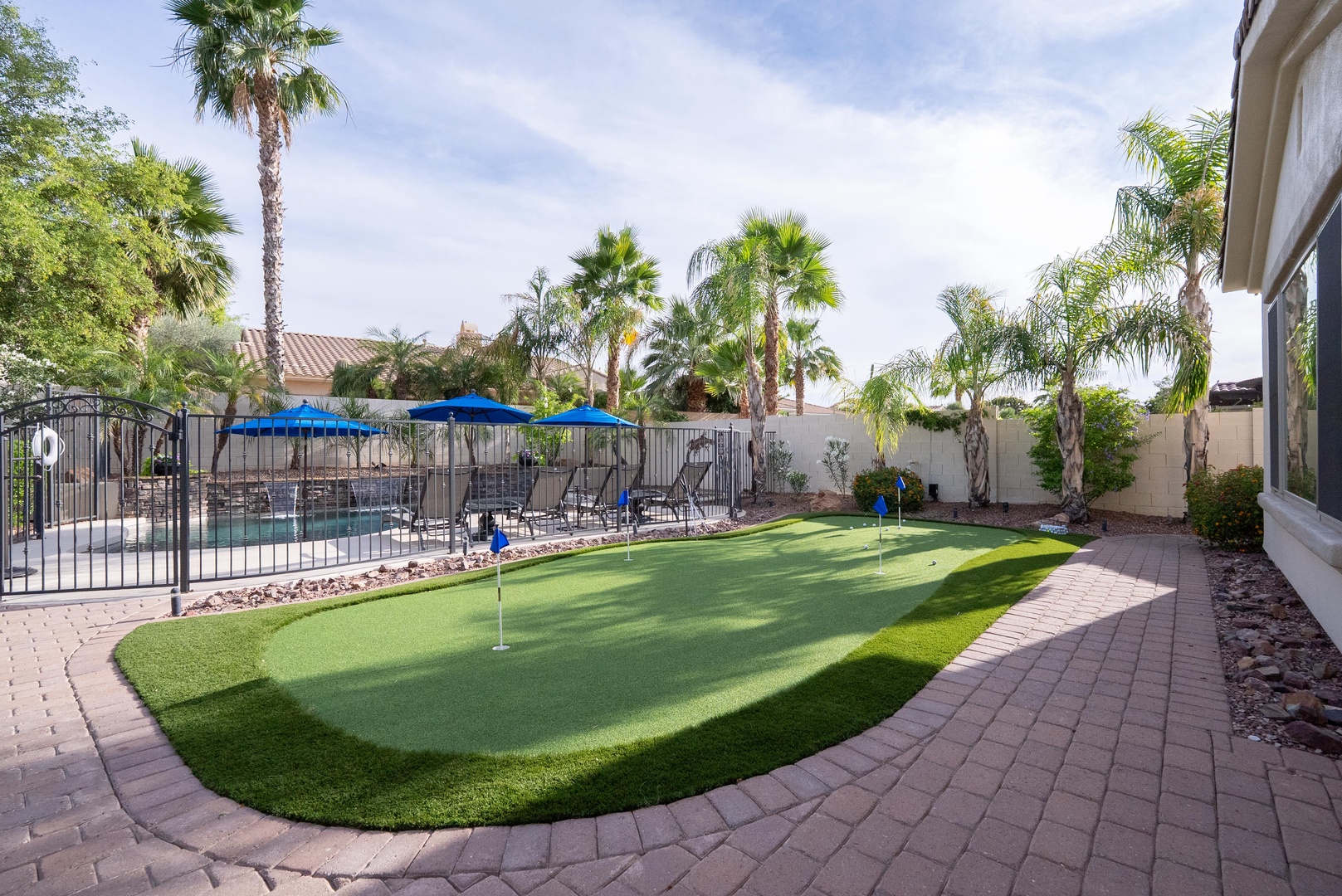 Private putting green overlooking the pool