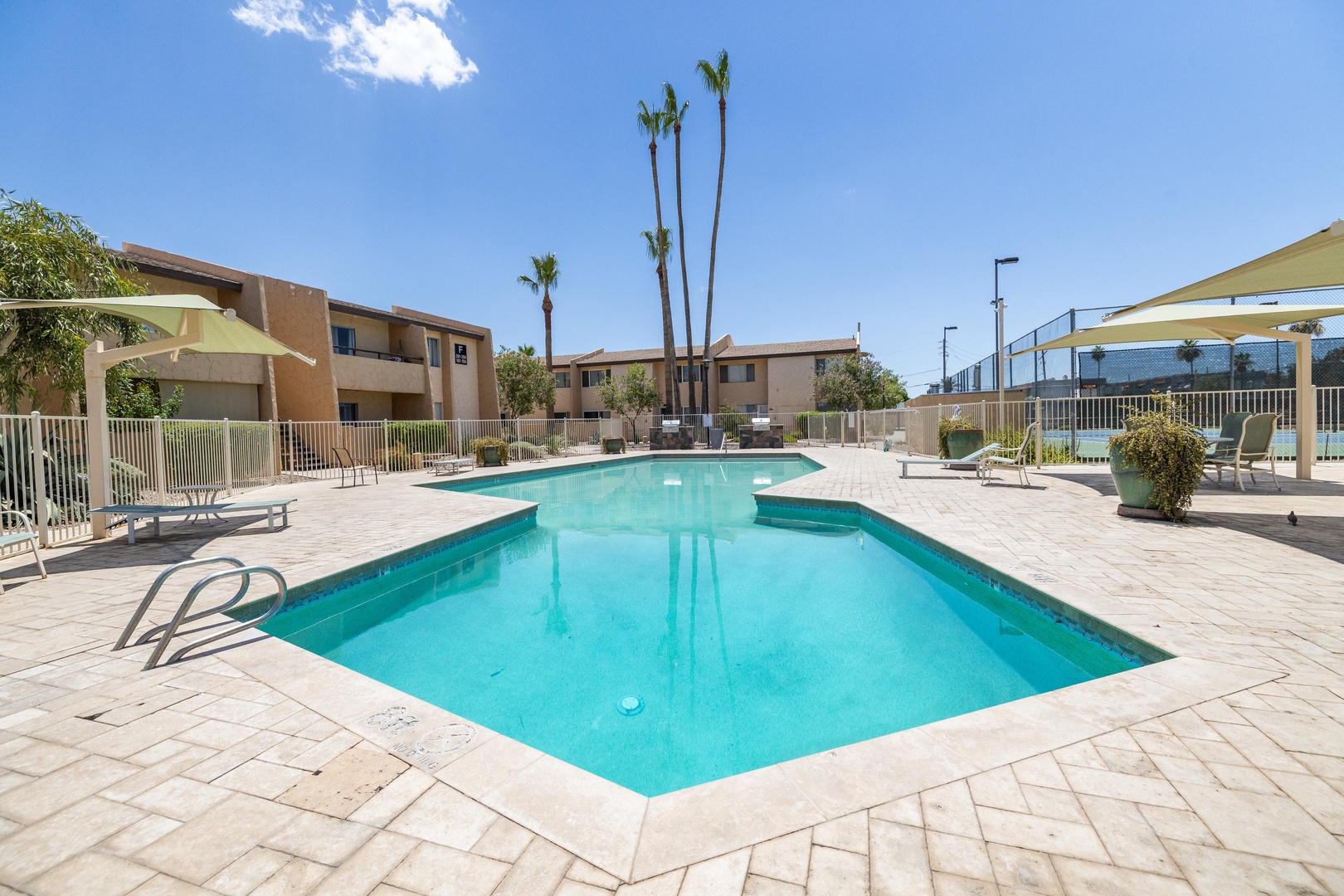 Year-round heated community pool for sunny afternoons and evening swims.