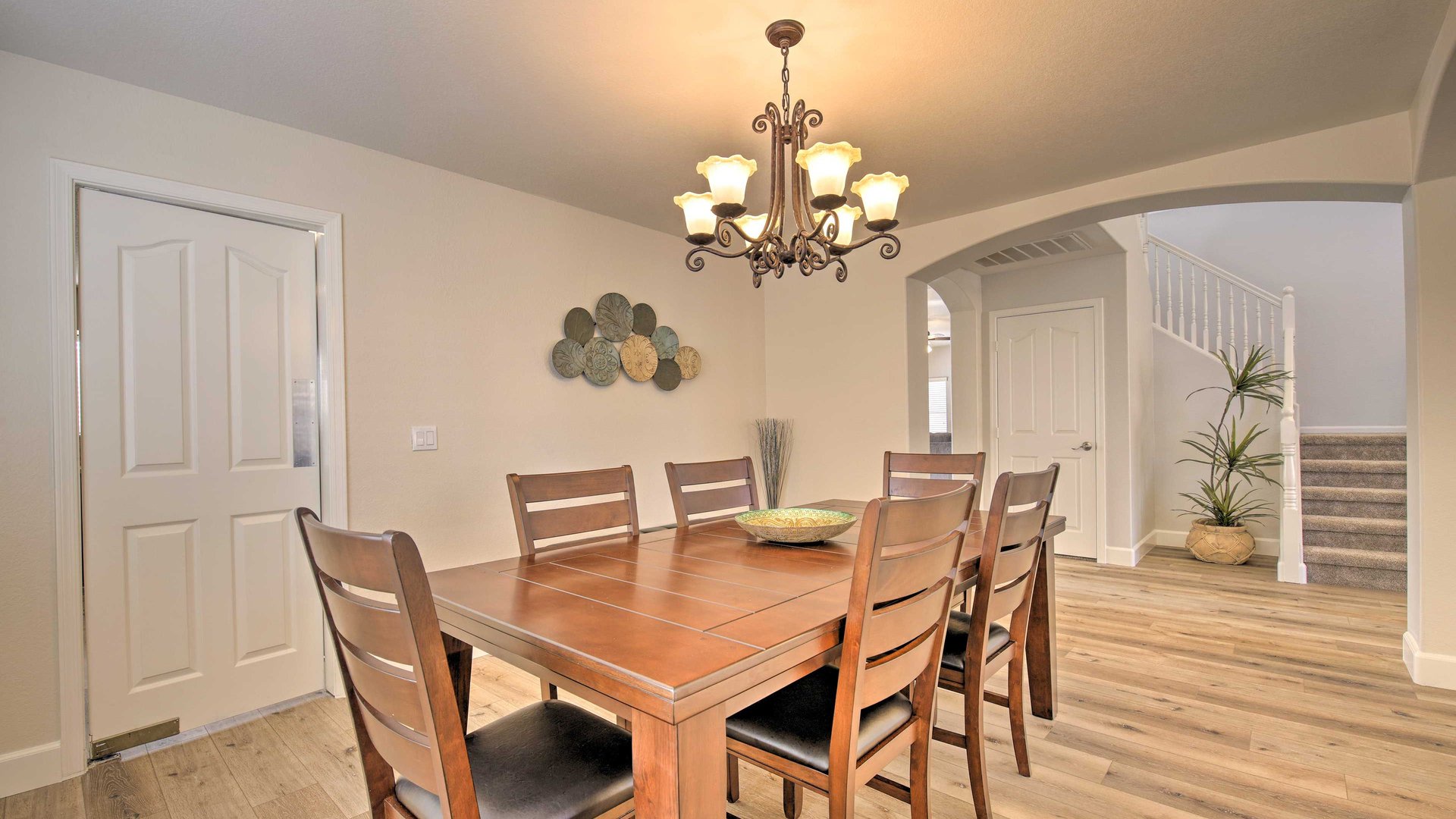Gather your group around this warm dining table
