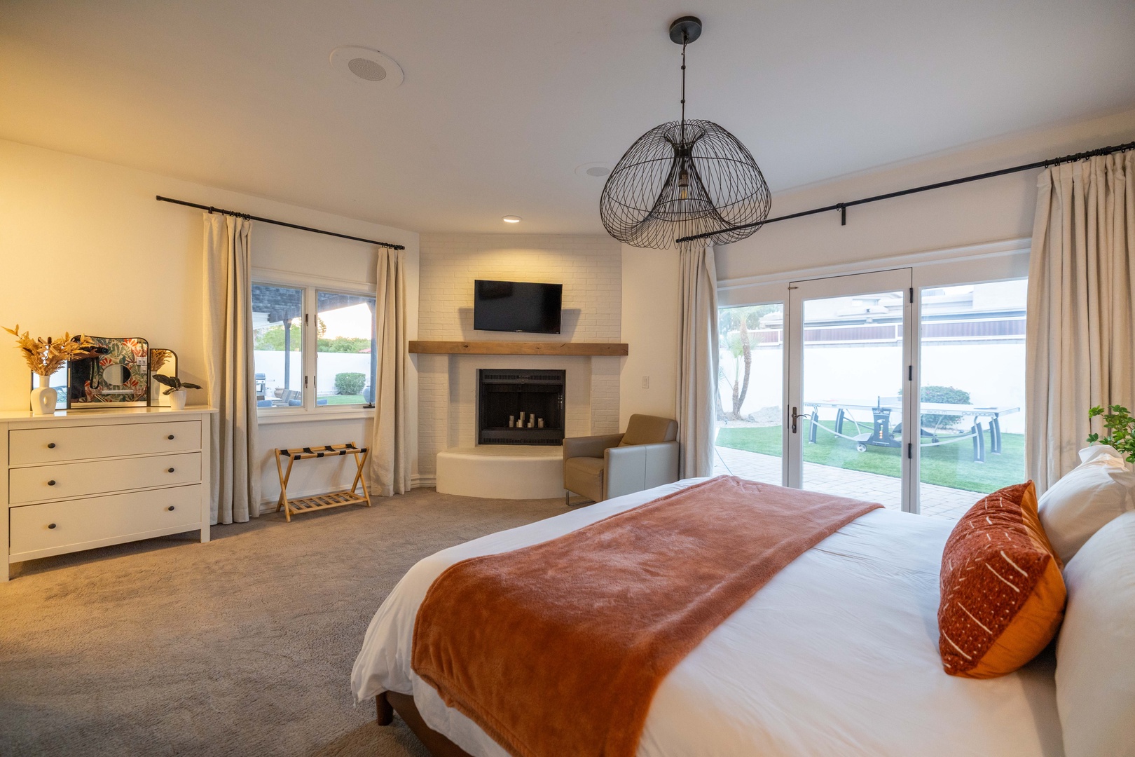 Master bedroom with King bed and TV